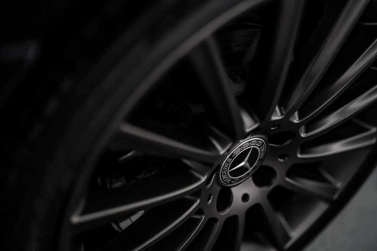 Close-up of a black alloy wheel